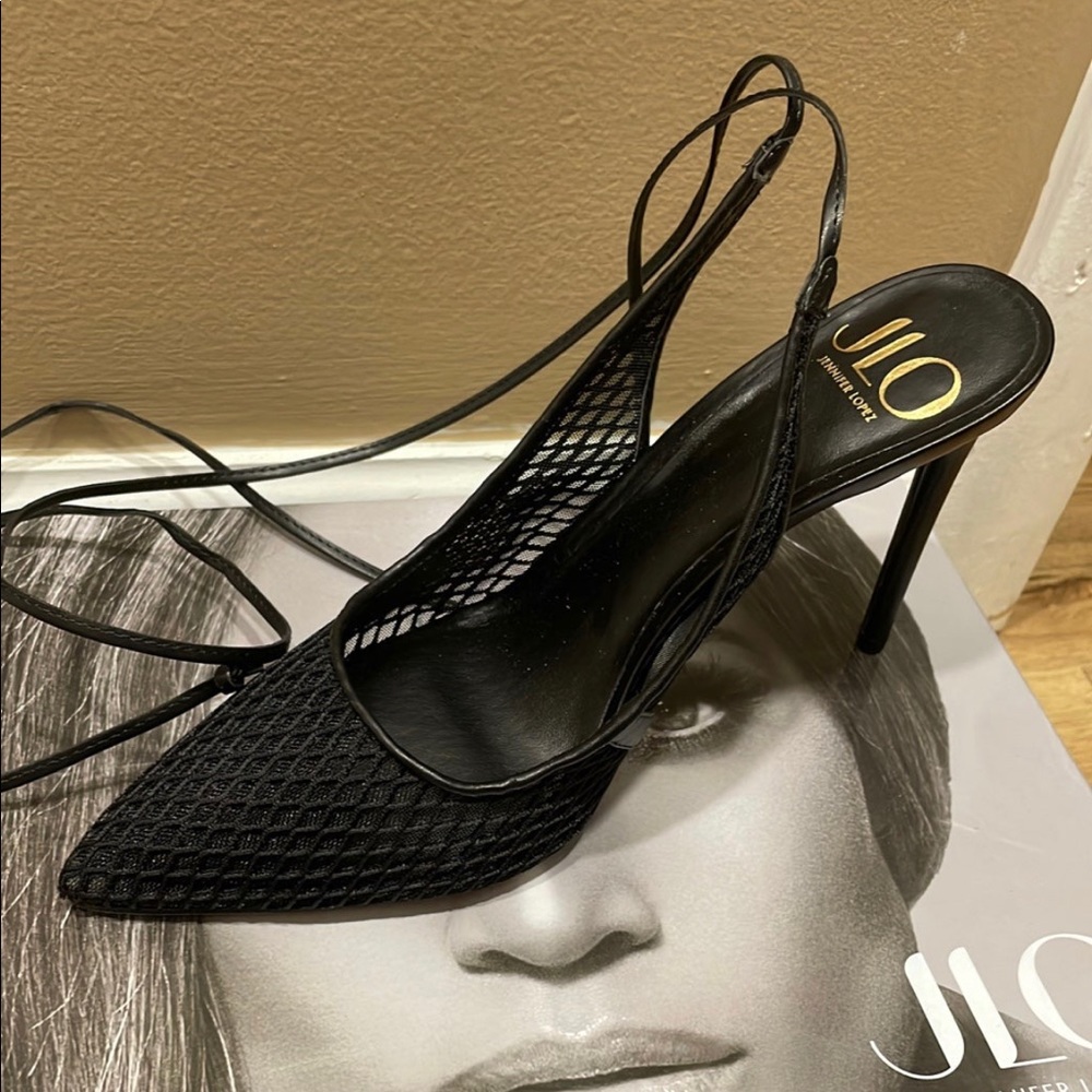 Brand new never worn lace up fish net material pumps